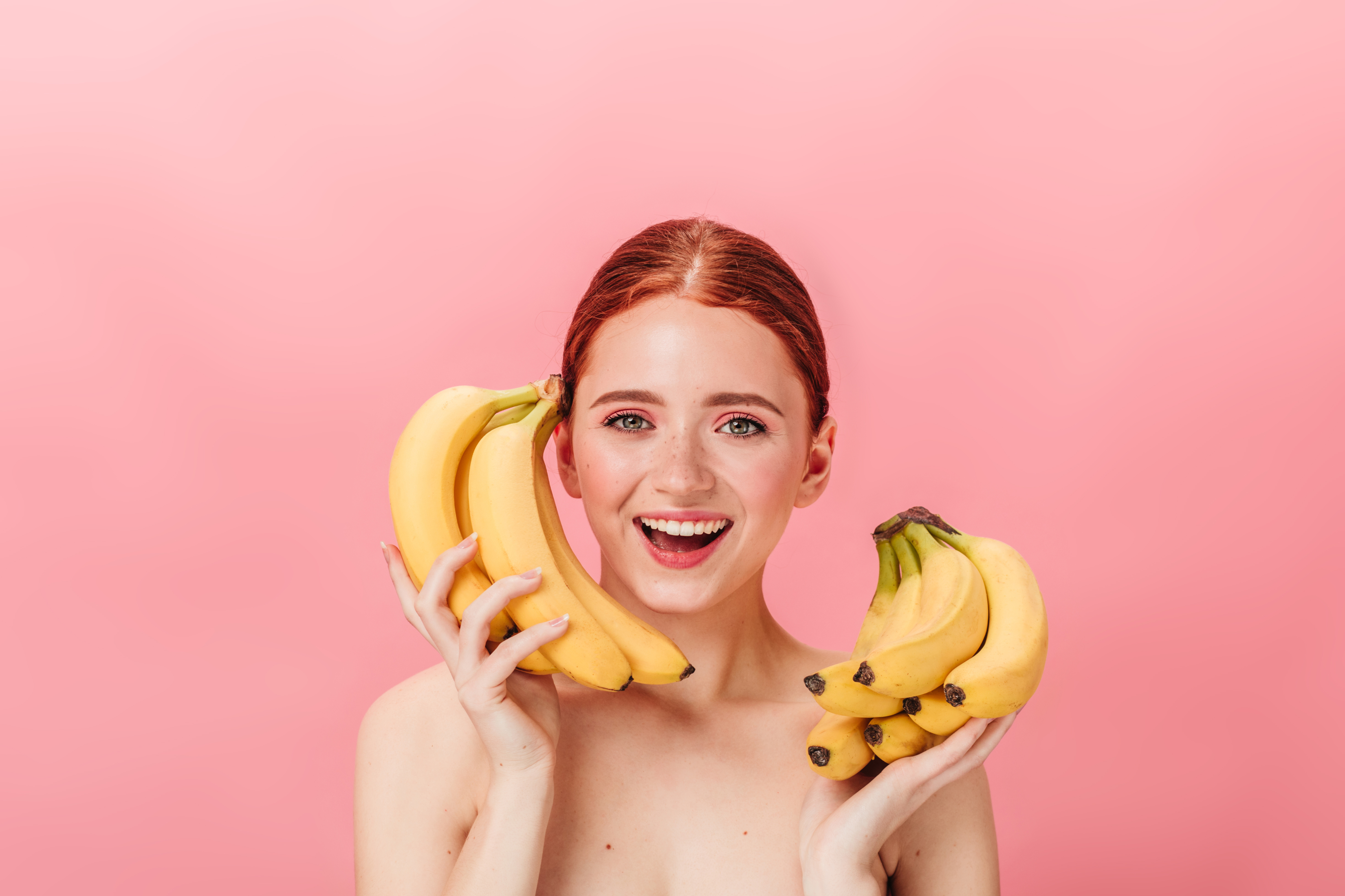 female with bananas