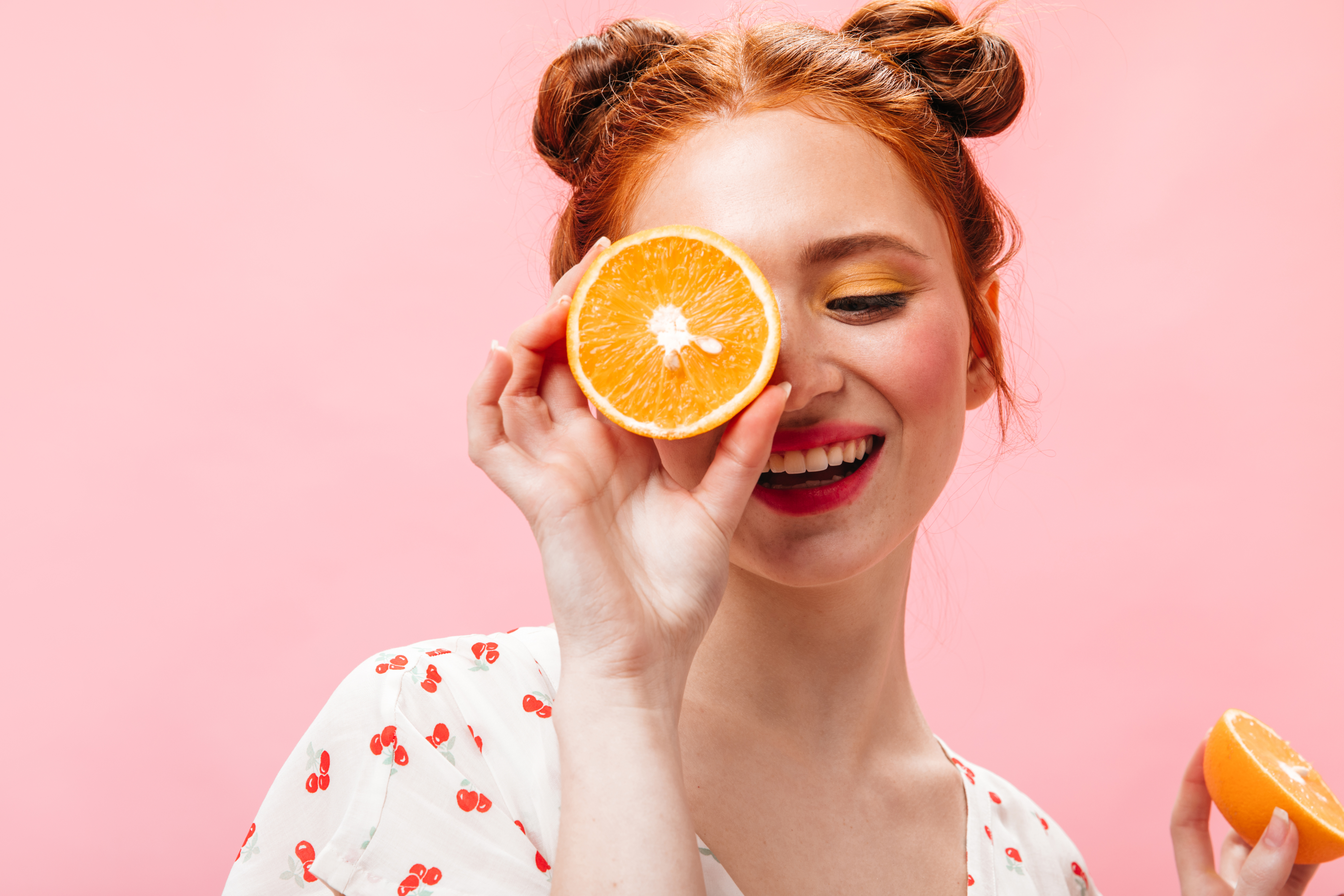 female with an orange